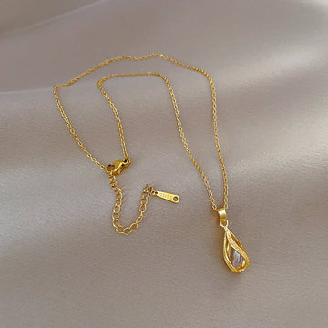 Rotating Teardrop Gold Necklace